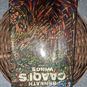 SOLD- Beneath CAAQIS Wings BOOK